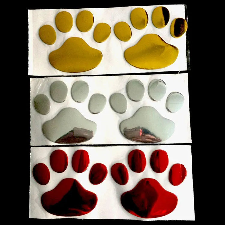 Hand-shaped brush car sticker with dog footprints design in red, silver, gold or black colour, 7 cm long.