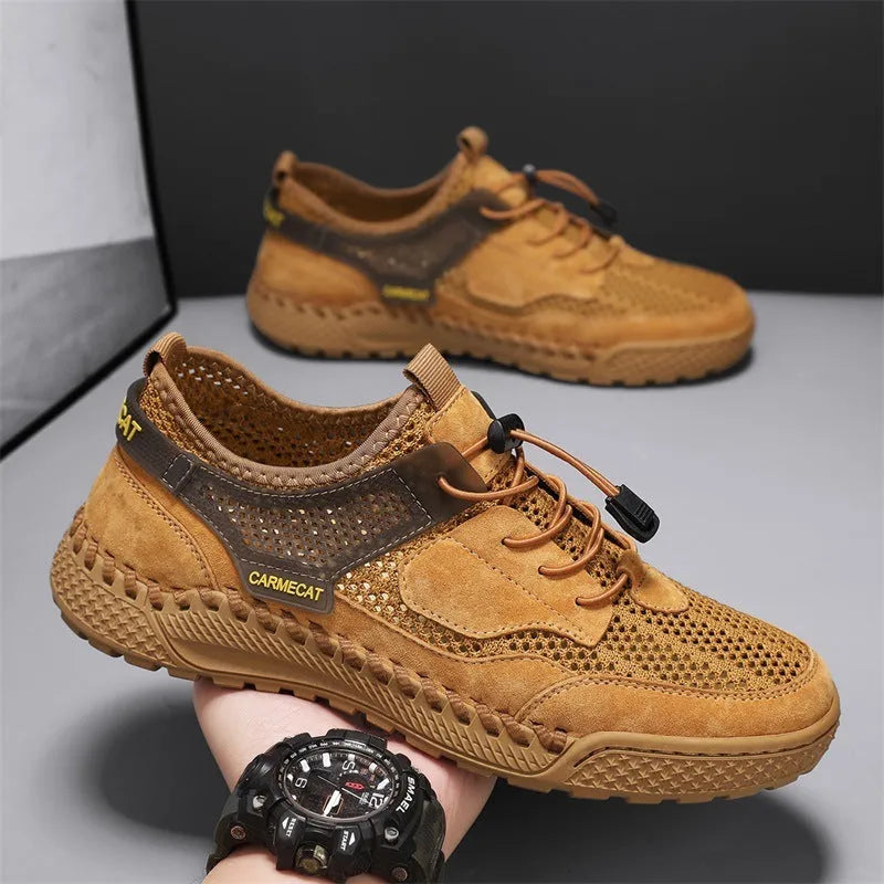 Men's brown suede tennis shoes with elastic closure and hand-stitched rubber soles