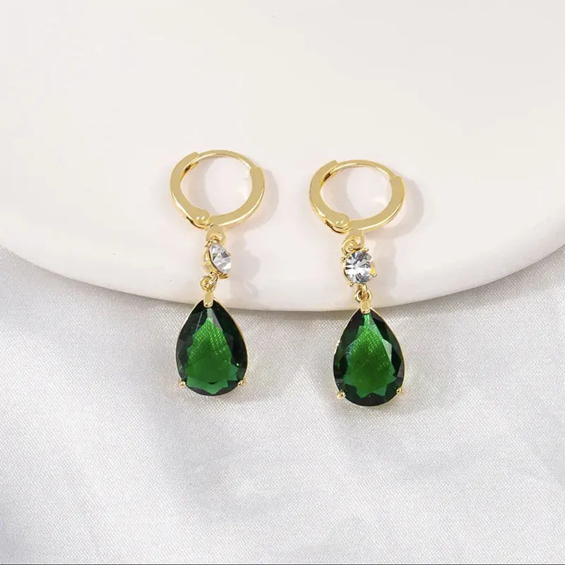 Geometric teardrop earrings in vivid green with alloy construction