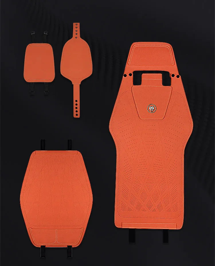 Ultra thin fur car seat cushion in Hermes orange colour with visible ventilation holes and leather backing