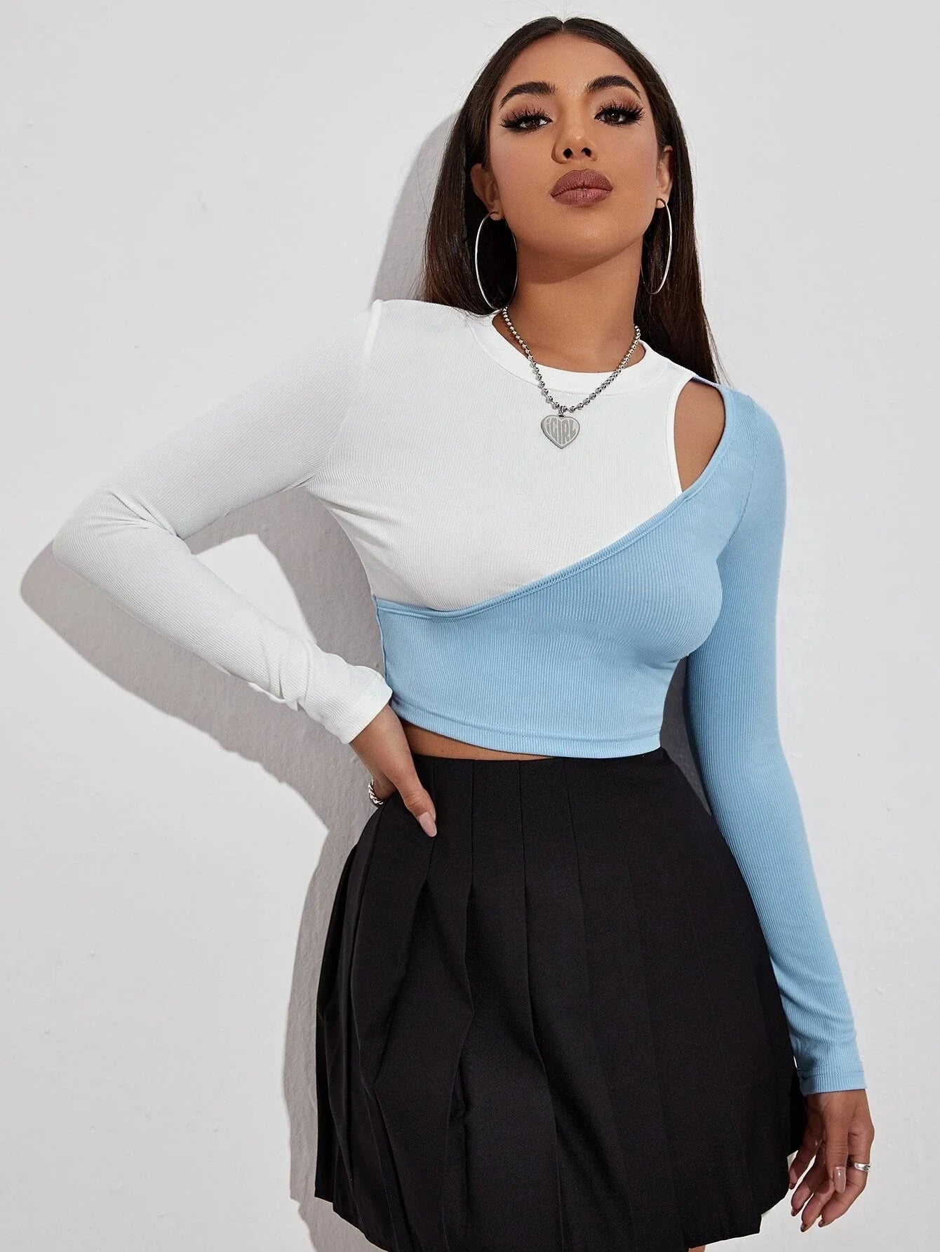 Stylish strapless colorblock crop top for women with flattering slim fit and playful cut-out detail