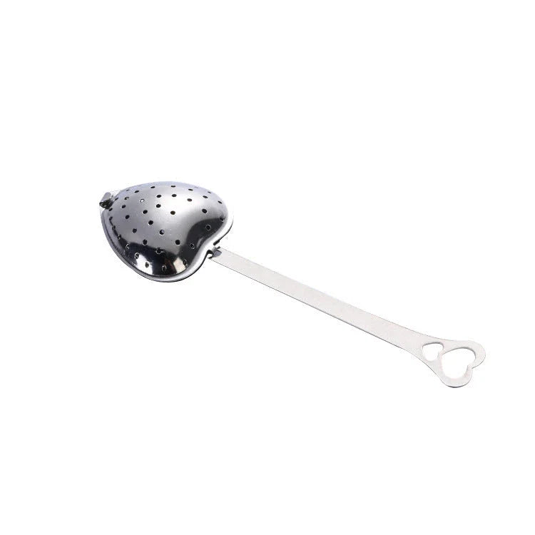 Heart-shaped stainless steel tea infuser with chain, perfect for steeping loose-leaf teas and spices