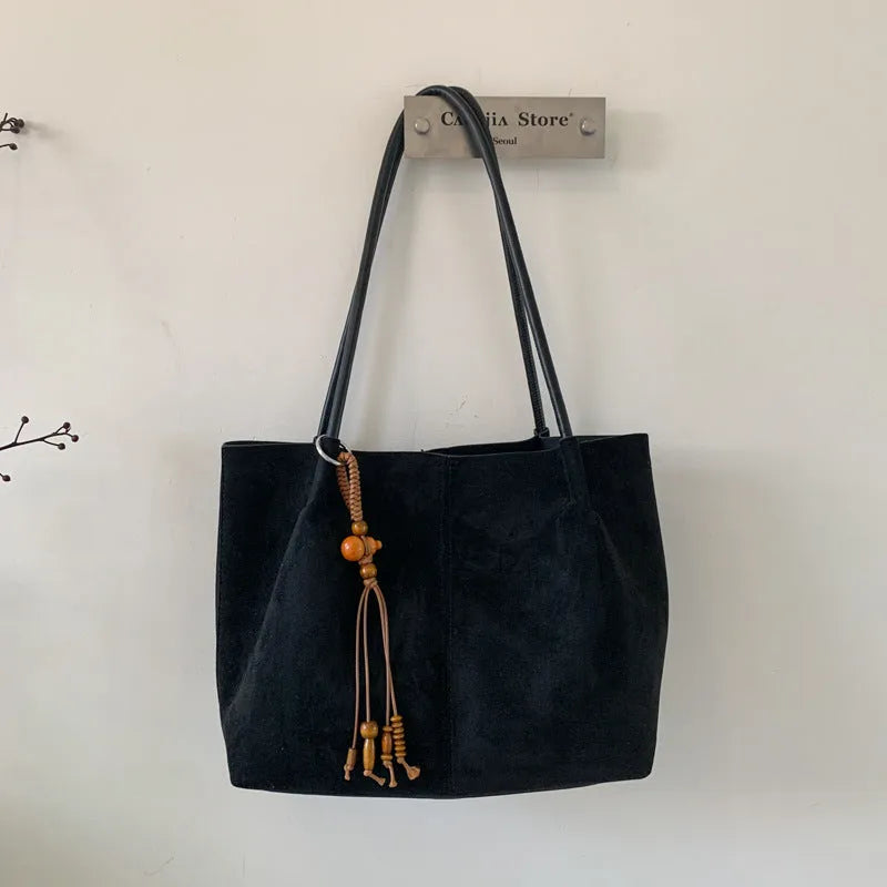 Large capacity suede tote bag in horizontal square shape with single shoulder strap, available in green with matching pendant