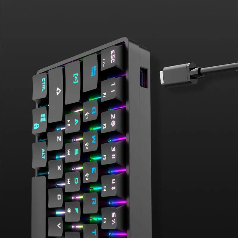 Wireless Bluetooth keyboard with colourful PBT keycaps in black casing on a desk