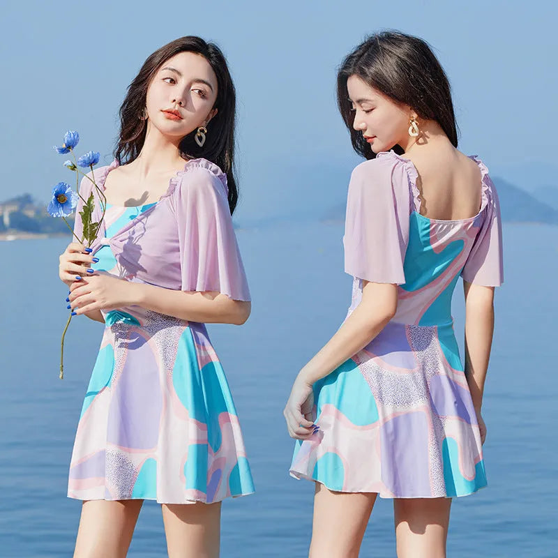 Women's high-waisted floral one-piece swimsuit in light purple or light blue pattern