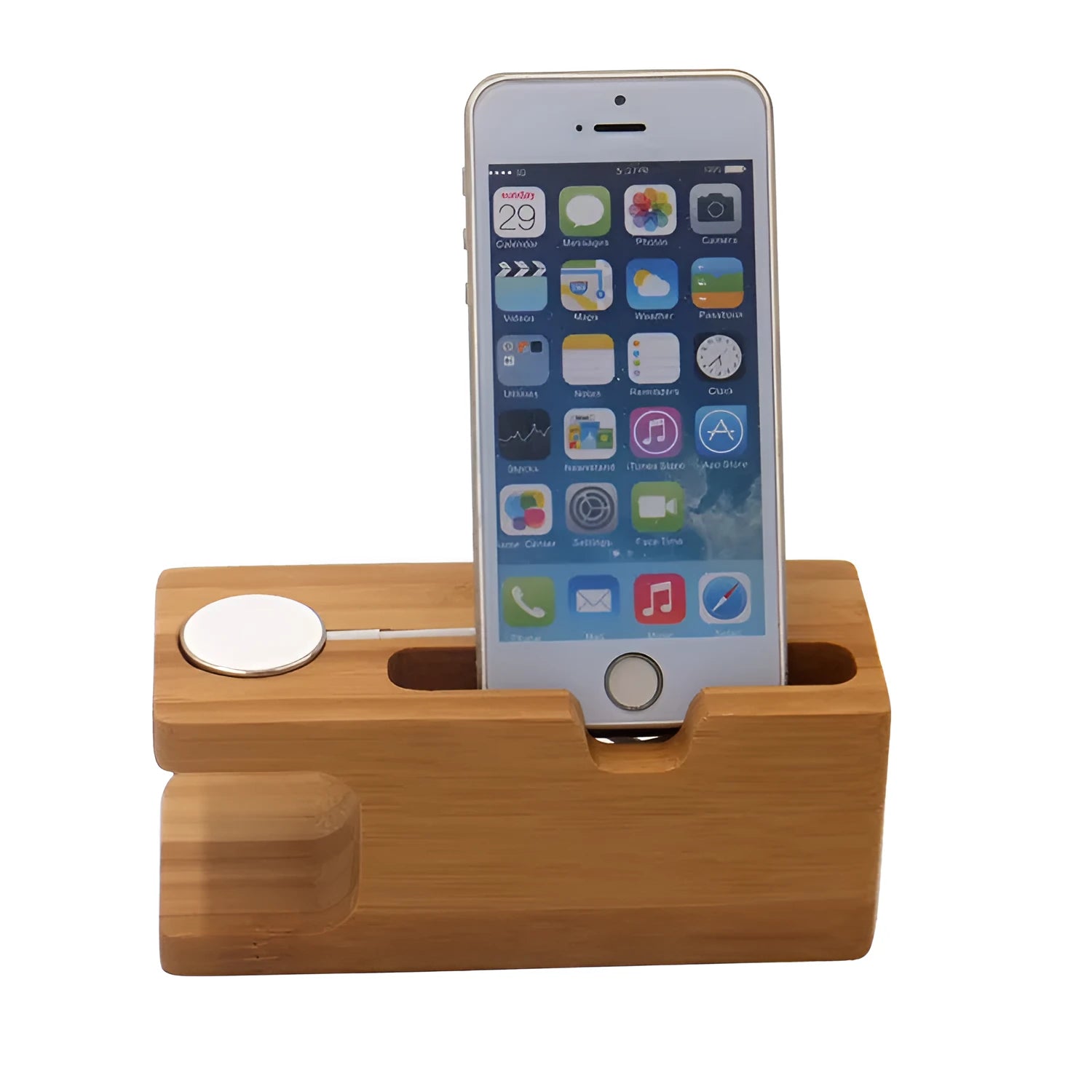 Natural bamboo smartphone stand with carved ornament detail on an office desk.
