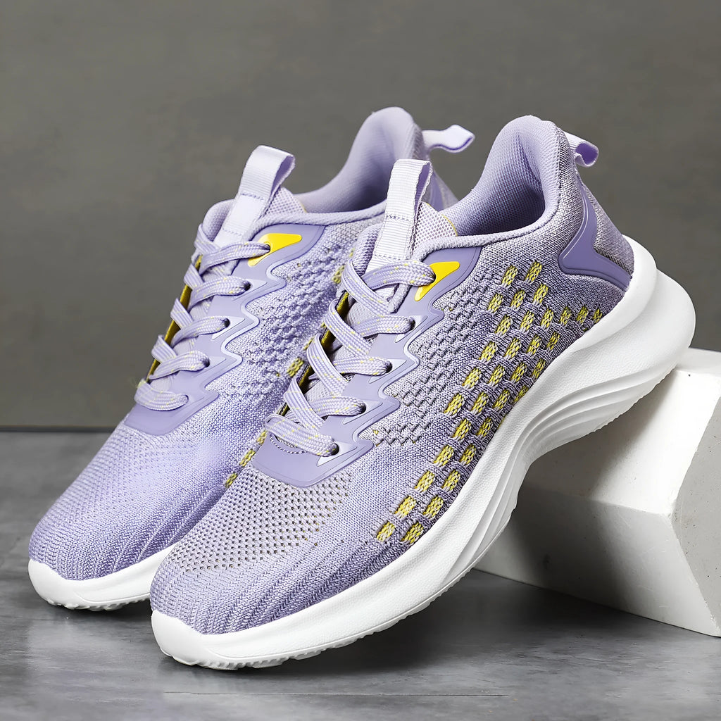Women's lavender purple Flyknit running shoes with mesh lining and striped pattern, flat heel