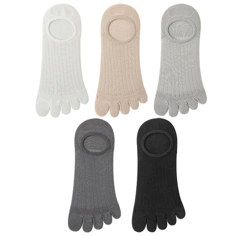Modal cotton five-finger boat socks in black, shown as a pair laid flat to detail the individual toe design.