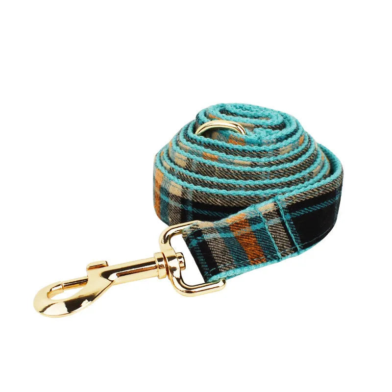 Retro green cloth dog collar, leash, vest, and bow four-piece accessory set