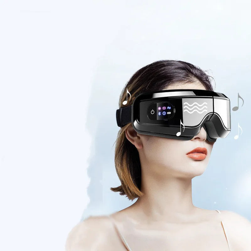 White eye massager with air pressure, hot compress, and vibration functions, USB-powered, with Bluetooth music