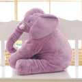Grey elephant-shaped plush pillow cover for a child's bed, shown alongside blue and pink versions.