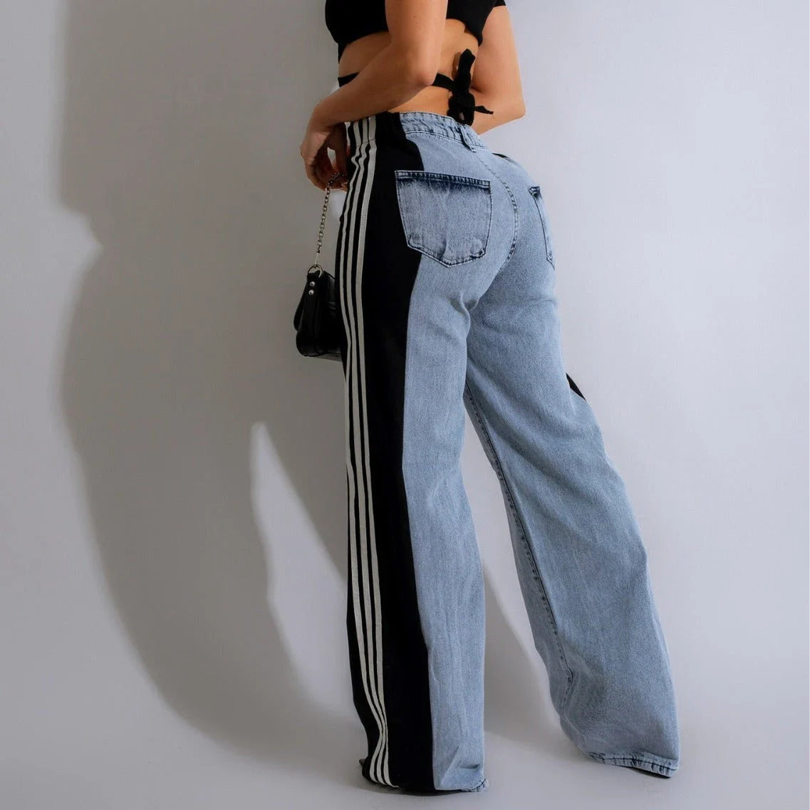 High-waist denim pants with a stylish patchwork design, available in various color options