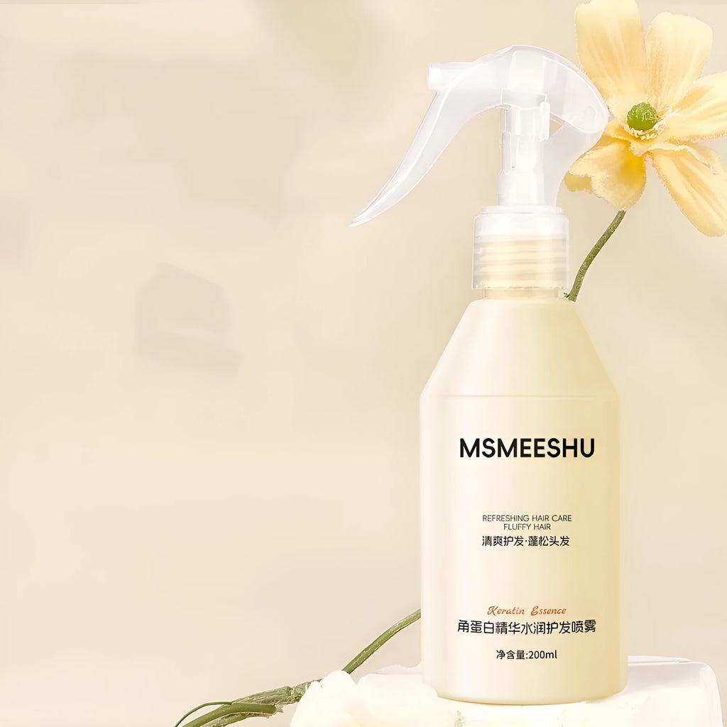 Honey Bundle Keratin Essence transparent hair care spray bottle with moisturising formula