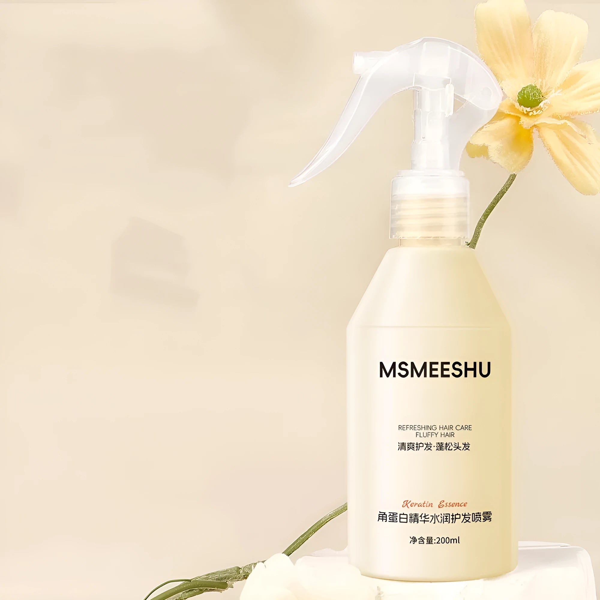 Honey Bundle Keratin Essence transparent hair care spray bottle with moisturising formula