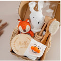 Baby teething toy set with bamboo fibre blanket, beechwood teether, tactile brush and developmental markers