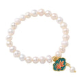 White antique bracelet with freshwater pearl and goldfish lotus pendant