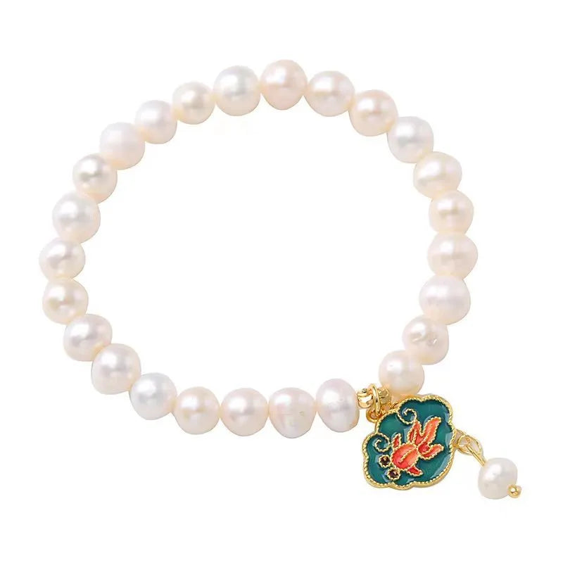 White antique bracelet with freshwater pearl and goldfish lotus pendant