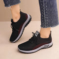 Women's round toe casual sneakers in black with breathable mesh and lace-up front