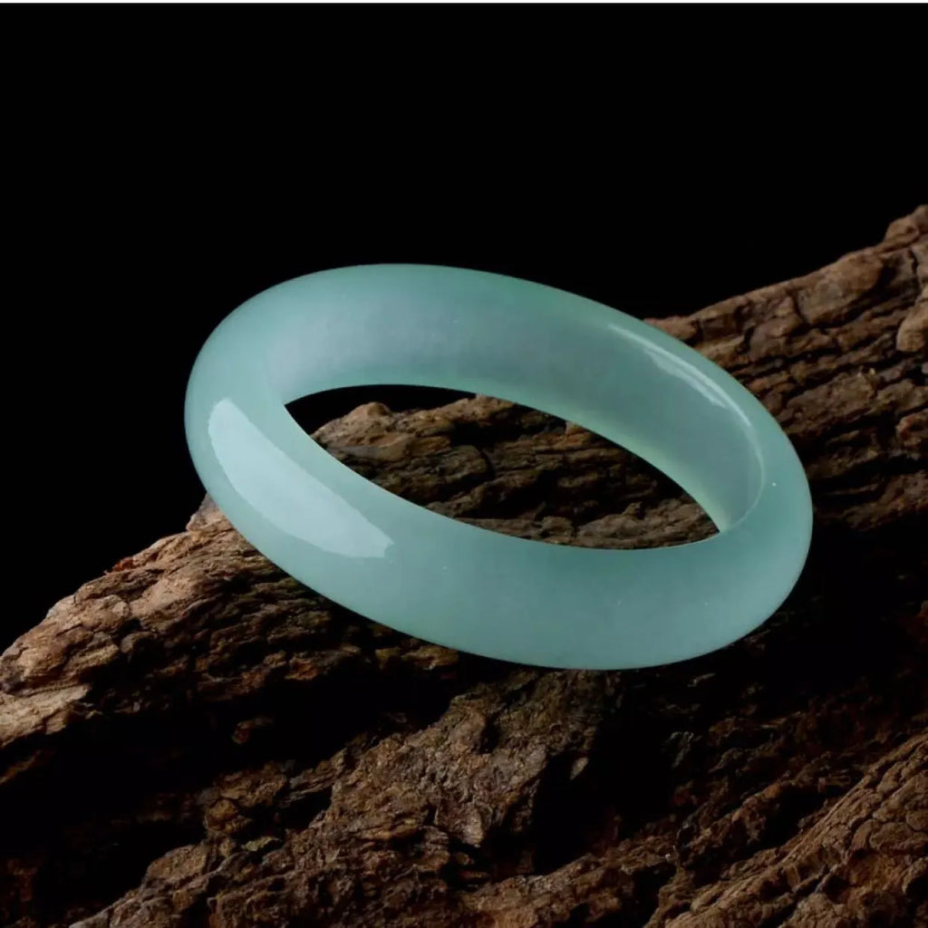 Women's oil cyan light green quartz jade bracelet showing modern simplicity design