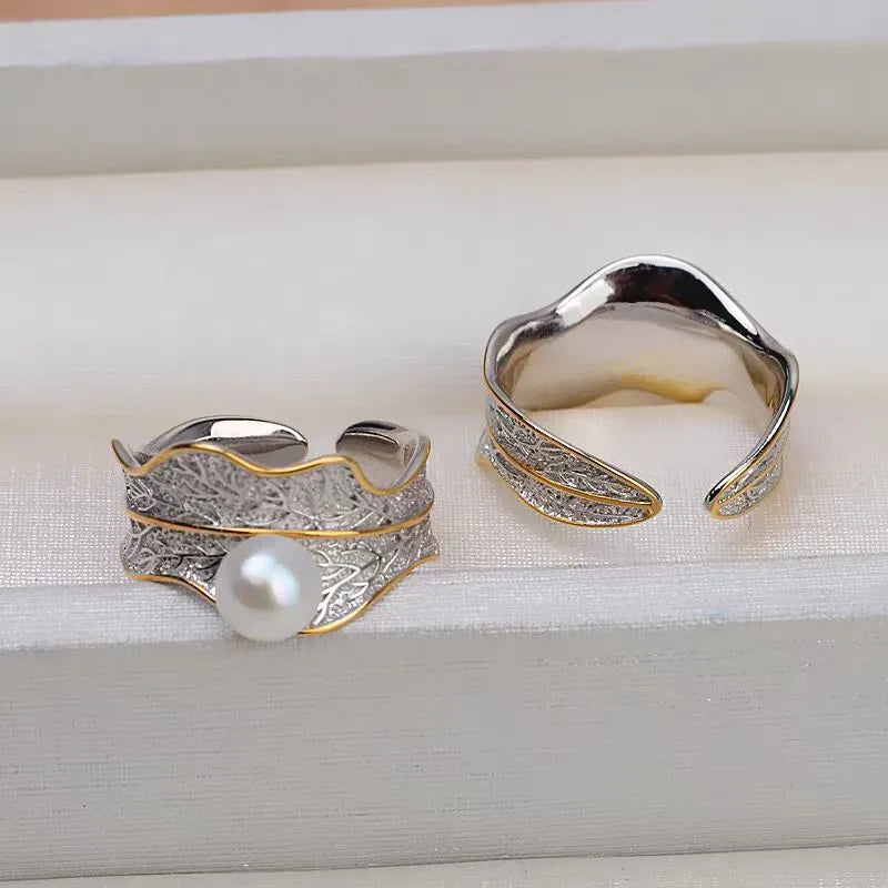 Freshwater pearl ring with irregular leaf design, electroplated metal band, pearl colour, adjustable opening