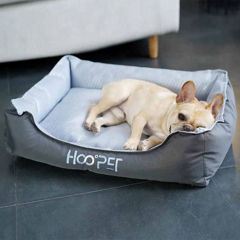 Soft grey dog bed with cat cave design and removable cover shown in small, medium, and large sizes.