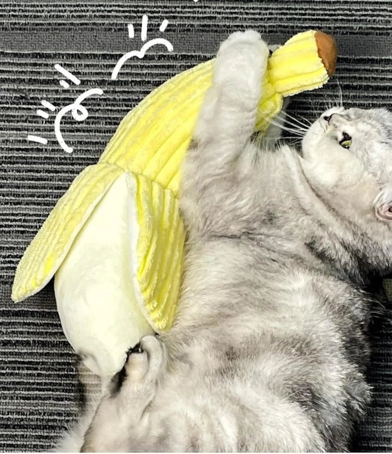 Yellow banana-shaped cat toy with plush fabric and crinkle paper sounds for indoor feline exercise