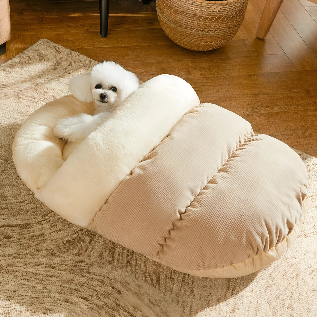 Plush slipper-shaped cat cave bed with corduroy exterior and Arctic velvet lining