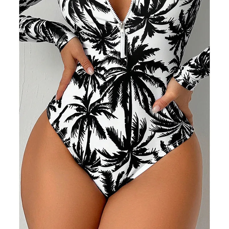 Women's one-piece printed swimsuit in blue with polyester and spandex lining, sizes S to XL.
