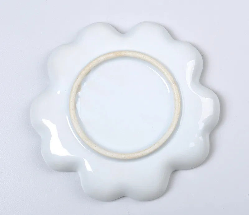 White ceramic painting palette with plum blossom design, shown in 6 inch, 7 inch, and 8 inch size options.