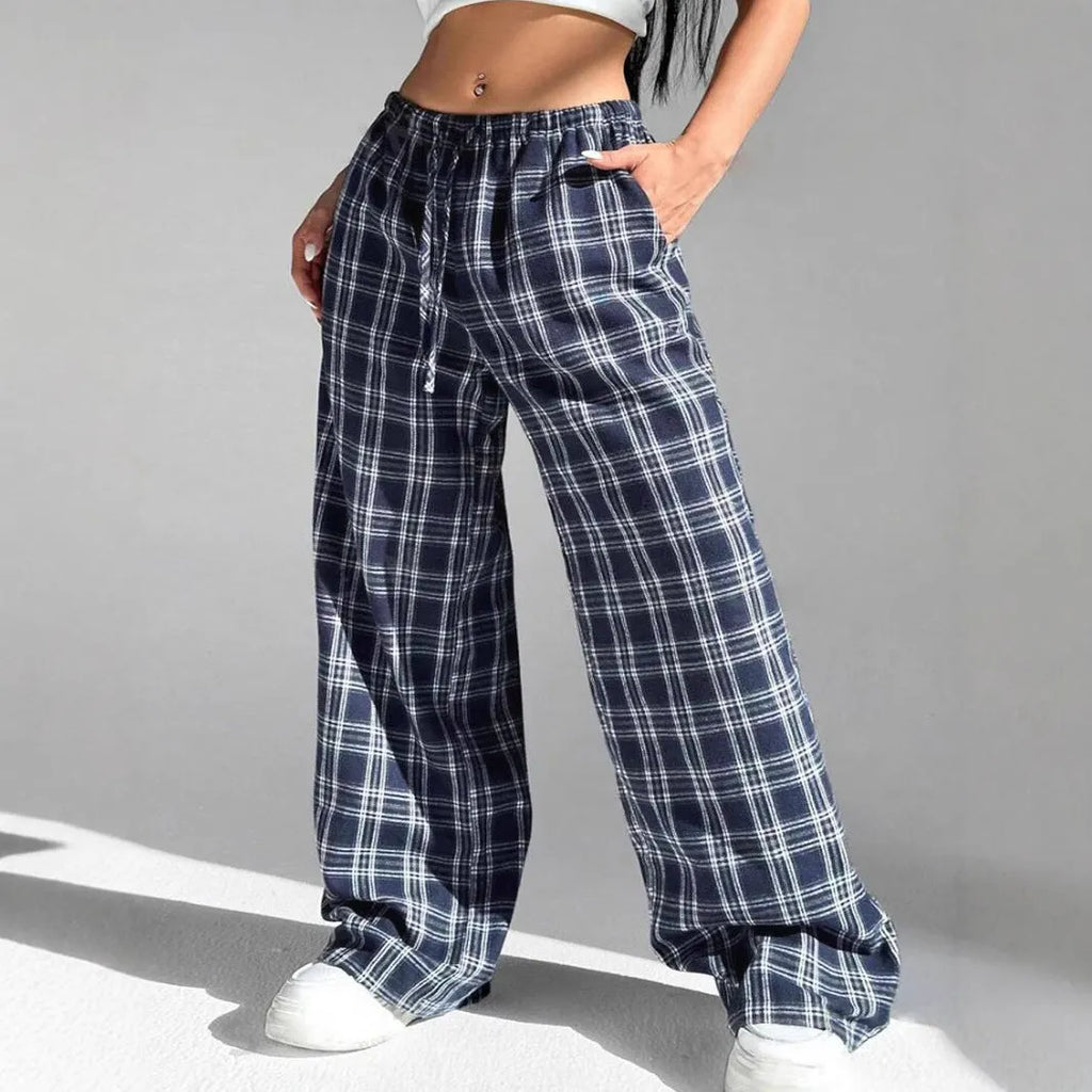 Women's casual trousers with drawstring waist and plaid pockets in blue or red colour options