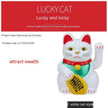 Solar powered Maneki Neko waving cat car dashboard ornament in yellow colour