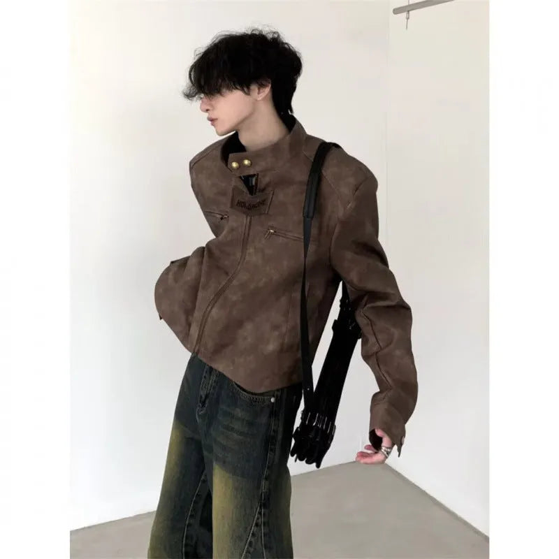 Men's retro brown PU leather short coat with tight fit and long sleeves on a plain background