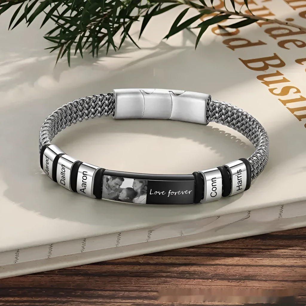 Titanium steel bracelet with leather rope design featuring lettering beads and heart charms