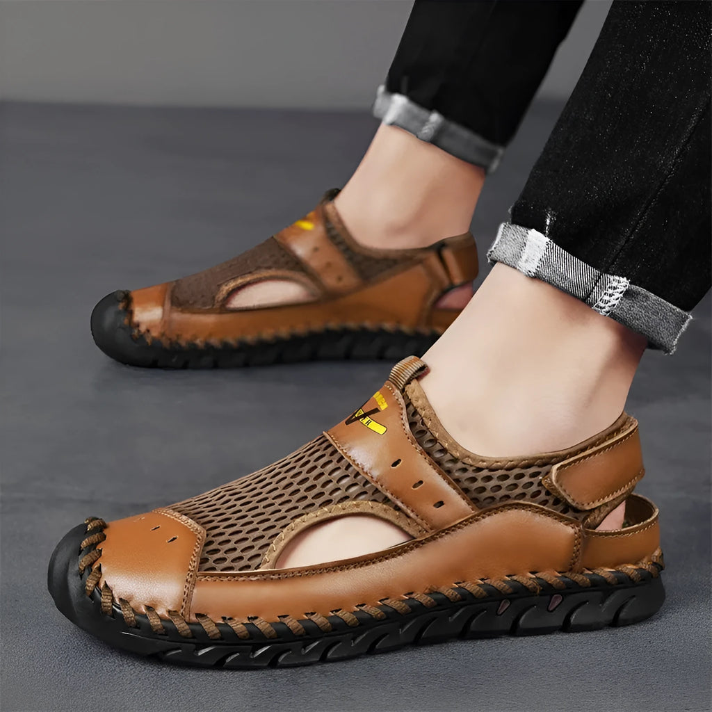 Men's brown leather casual sneakers with mesh panels and an elastic band across the instep.