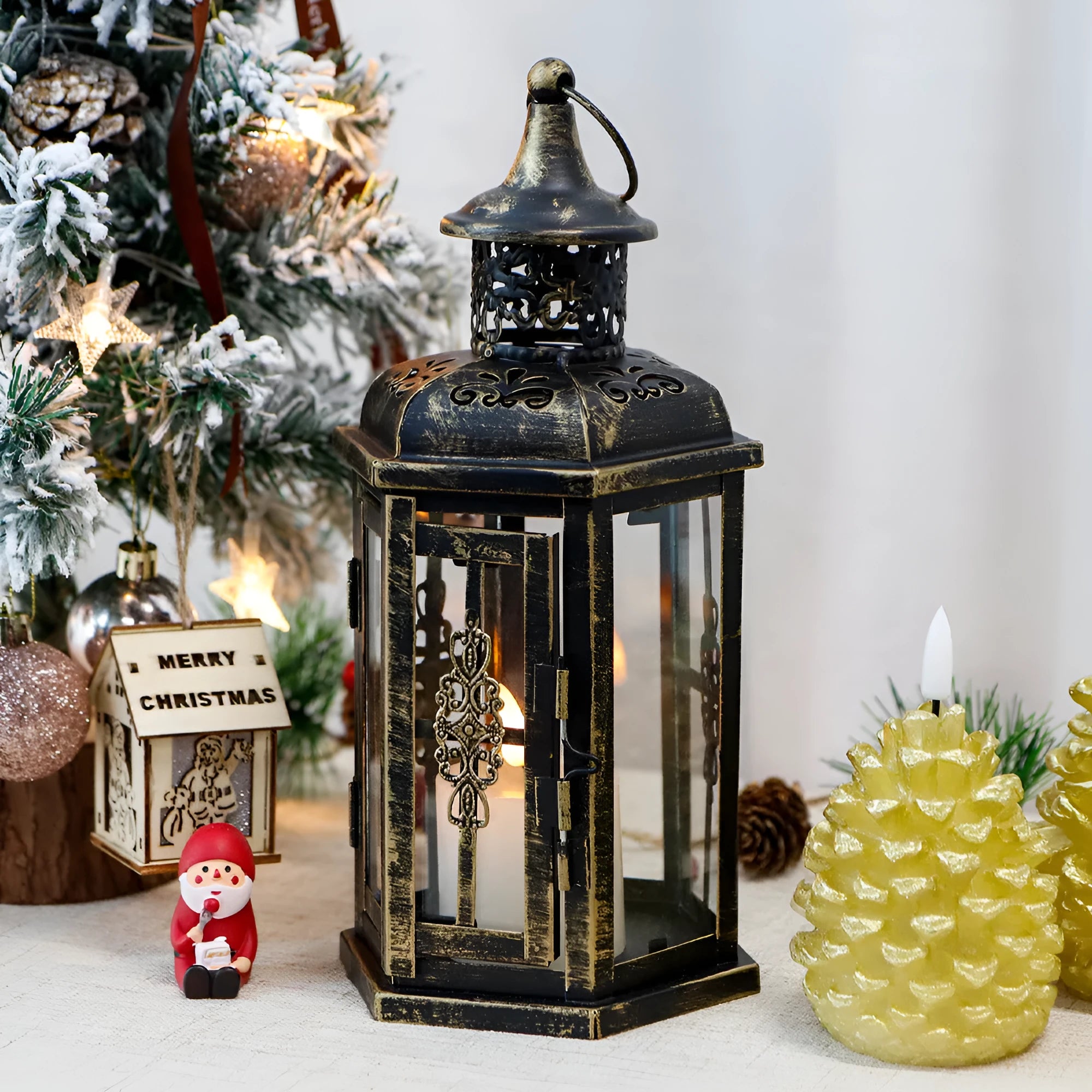 Black retro metal candle holder with glass insert on a wooden surface