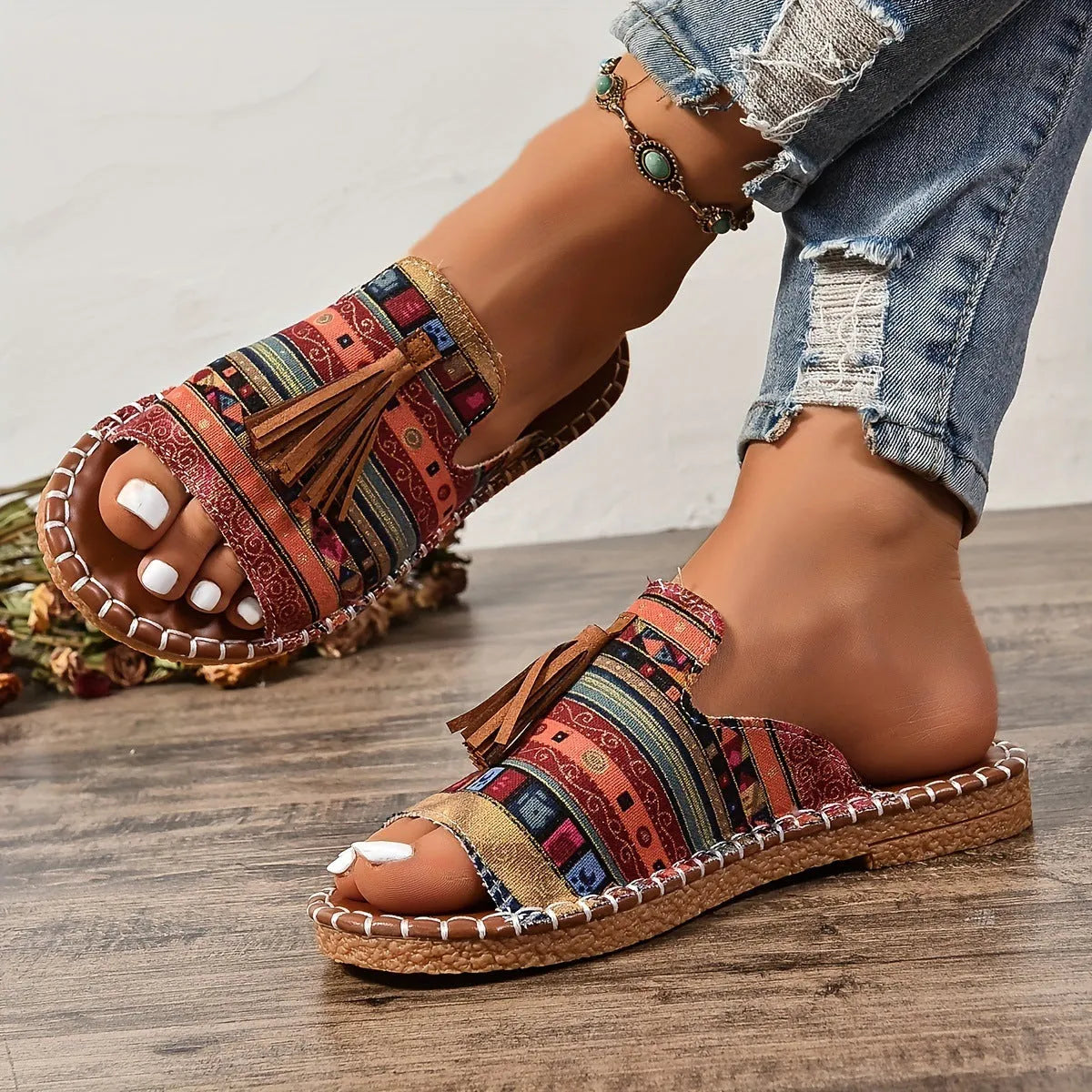 Women's tassel flat sandals in first layer cowhide with grape particle accents, Roman style, fish mouth toe, available in multiple colours