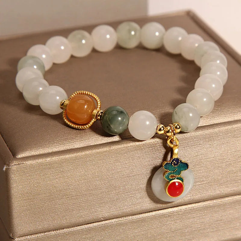 Women's ice jade bracelet with Xiangyun peace buckle and pearl decorative elements