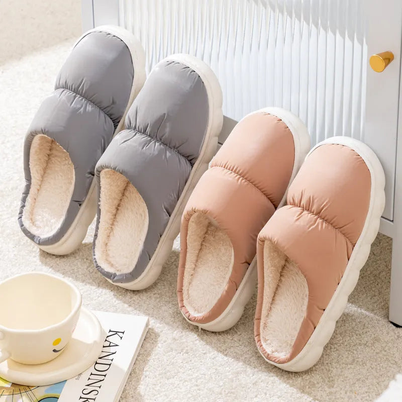 Blue thick-soled indoor slippers with artificial leather upper and plush lining on a rubber sole.