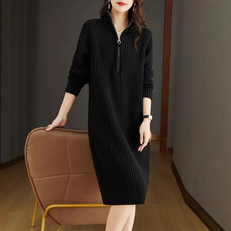 Beige casual skirt with half front zipper, stand collar, and long sleeves on a mannequin.