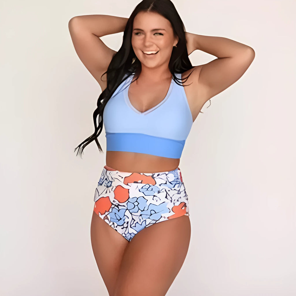 Women's conservative blue polyester one piece split swimsuit with vest top and full coverage