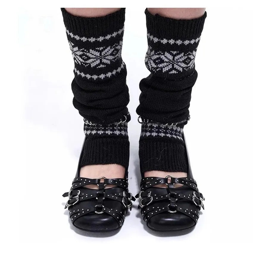 Women's black patent leather retro pumps with a square toe and silver buckle closure on a low rubber sole.