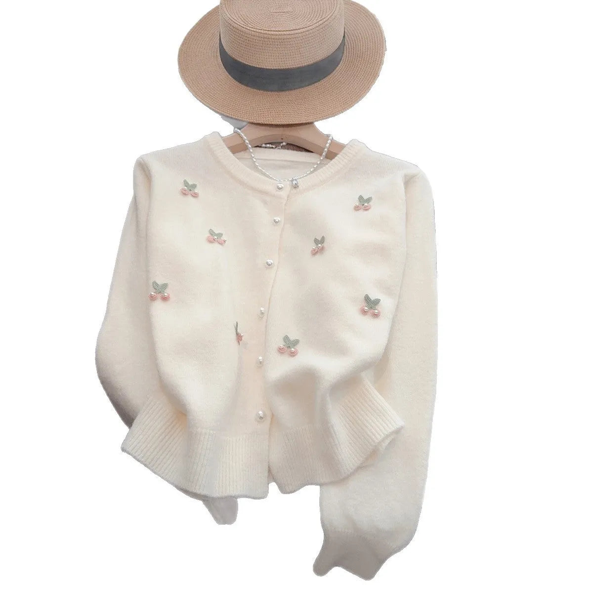 Women's pink cashmere blend cardigan coat with beaded detailing on the round neck, shown open as a slim-fit layer.