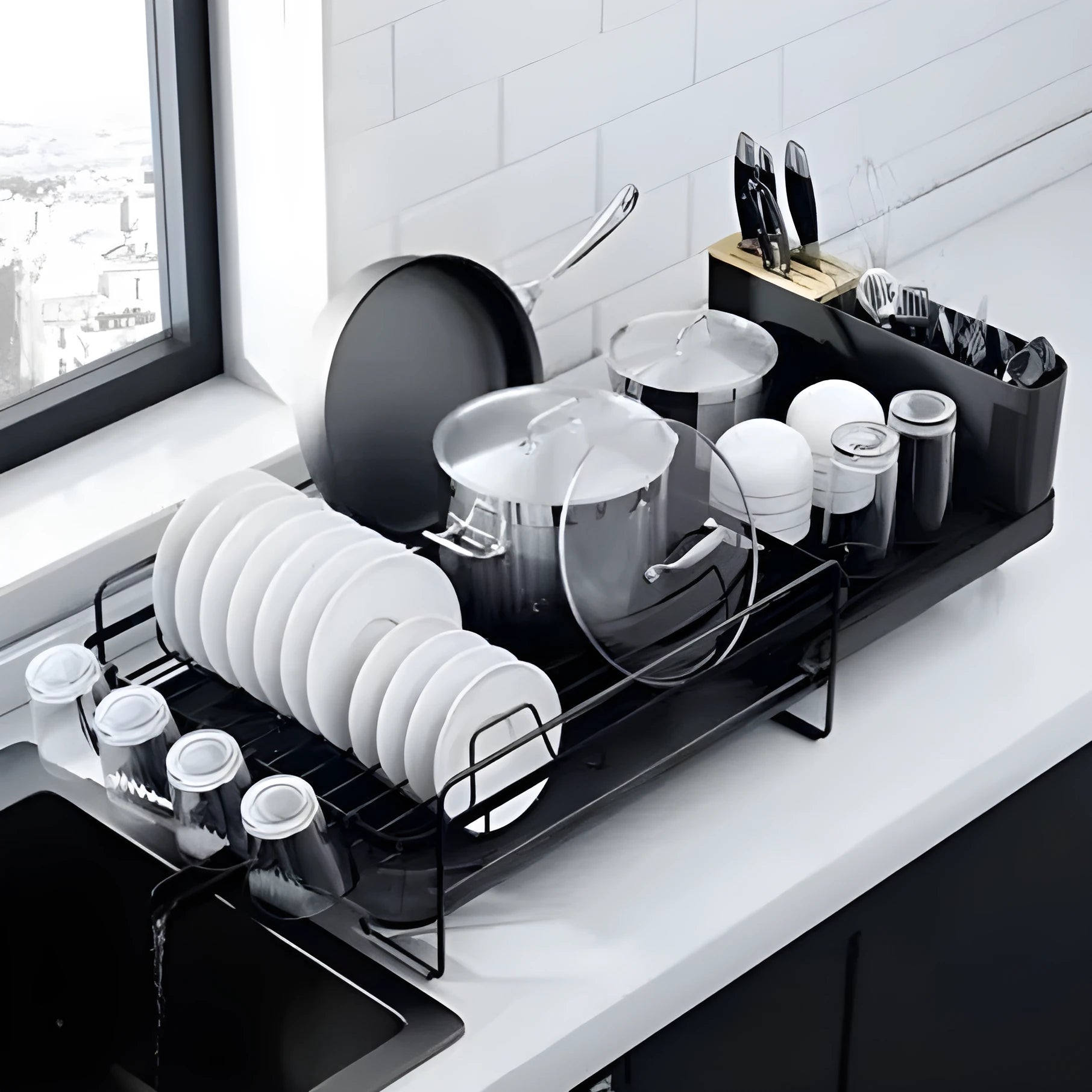 Retractable carbon steel kitchen drain rack for cutlery and cup drying, shown in folded and extended positions.
