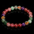 Natural tourmaline colour strawberry quartz bracelet with round geometric beads.
