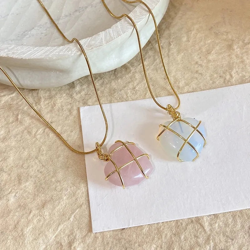 Heart-shaped moonstone pendant necklace on copper chain with electroplated real gold finish