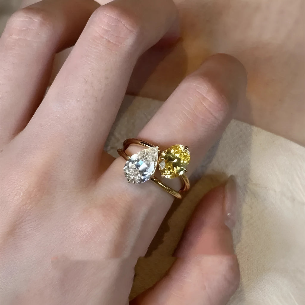 Geometric open ring with water drop double Sheng stone zircon centrepiece on copper setting