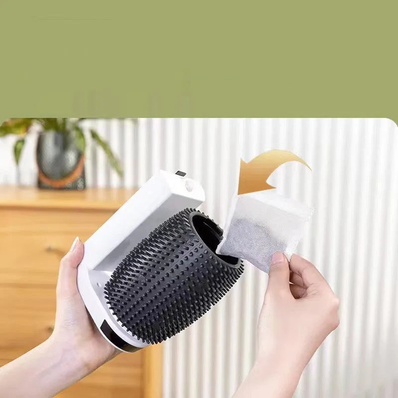 White automatic cat grooming brush mounted on a wall corner, showing USB cable and soft bristles.
