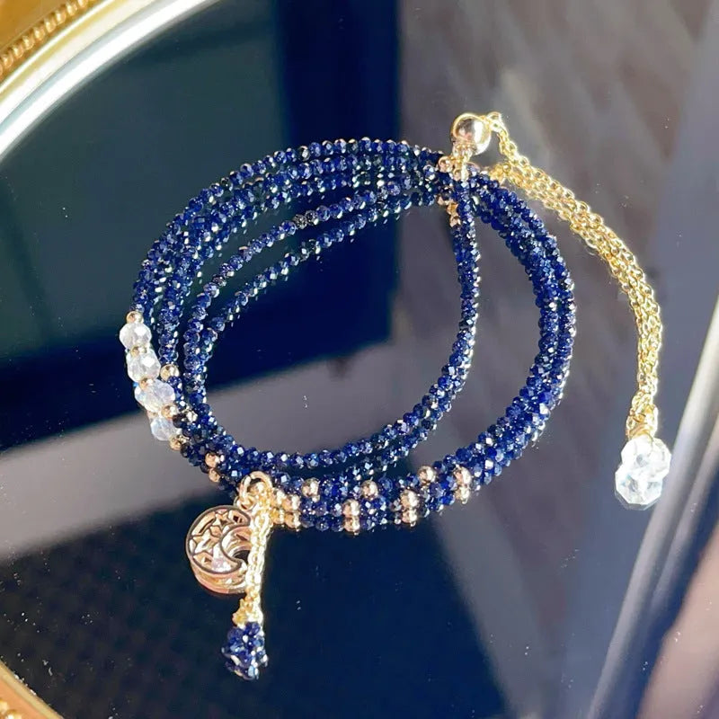 Women's blue San three-ring multi-layer bracelet showing manual craftsmanship details