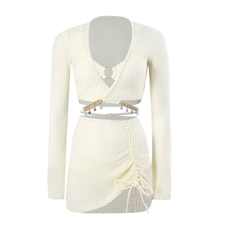 Women's black long sleeve bikini swimsuit with split hot spring design on white background