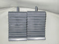 Car tyre skid stop parking locator set showing triangular anti-slip devices in black and silvery colours